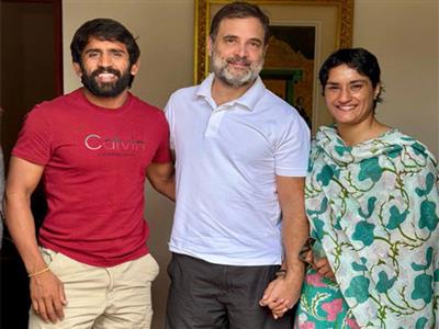 Wrestlers Vinesh Phogat, Bajrang Punia meet Rahul Gandhi, likely to contest Haryana assembly polls