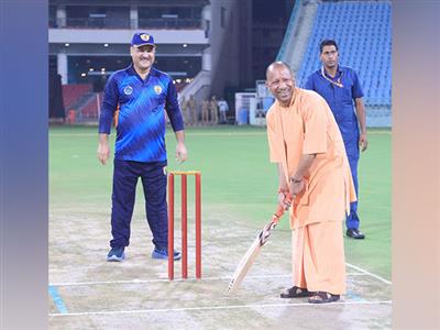 CM Yogi all smiles after trying his hand with bat during All India Advocate Cricket Tournament