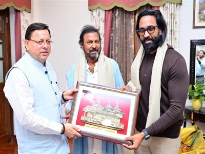 Uttarakhand CM Dhami meets Telugu cinema actor M B Naidu, his son Vishnu Manchu