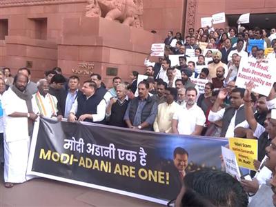 INDIA bloc MPs stage protest over Adani issue on Parliament premises